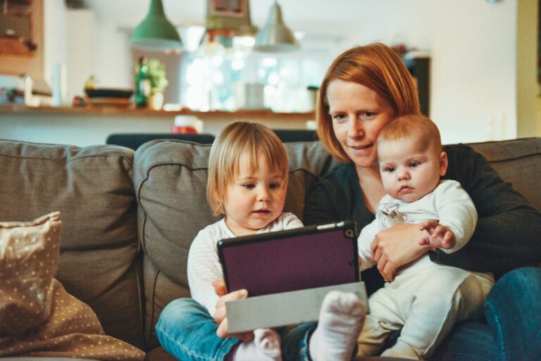 Family using technology at home, representing AI parenting and digital safety