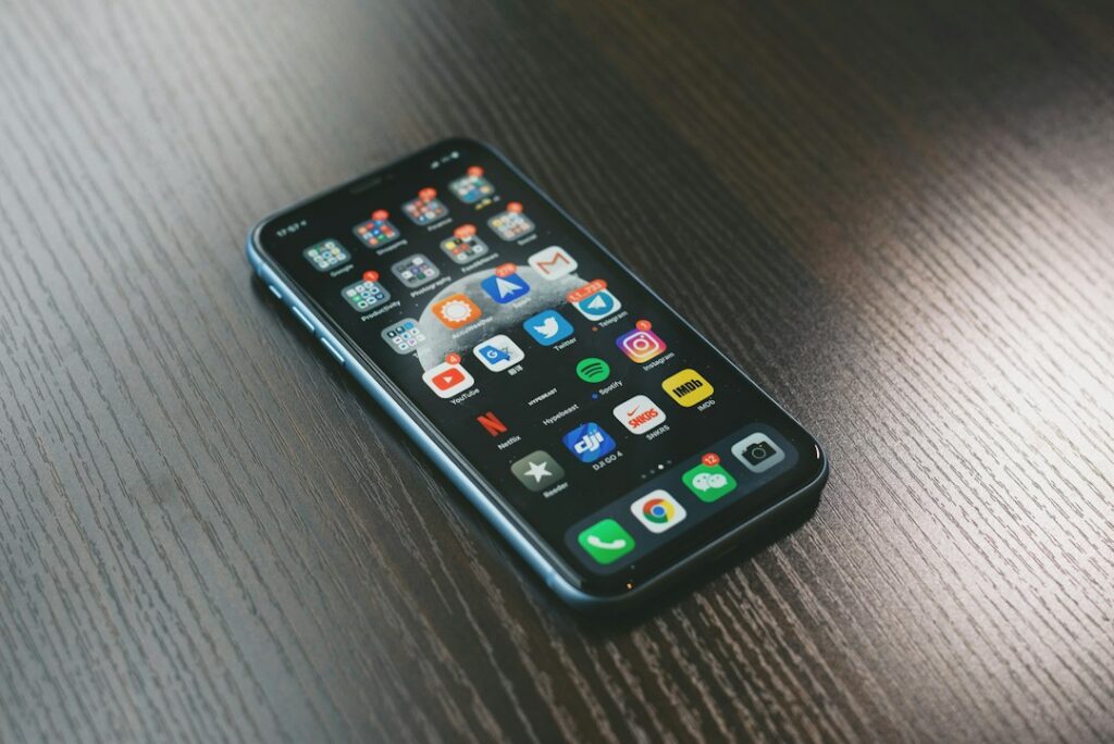 Smartphone and digital tools representing an AI personal assistant managing everyday life