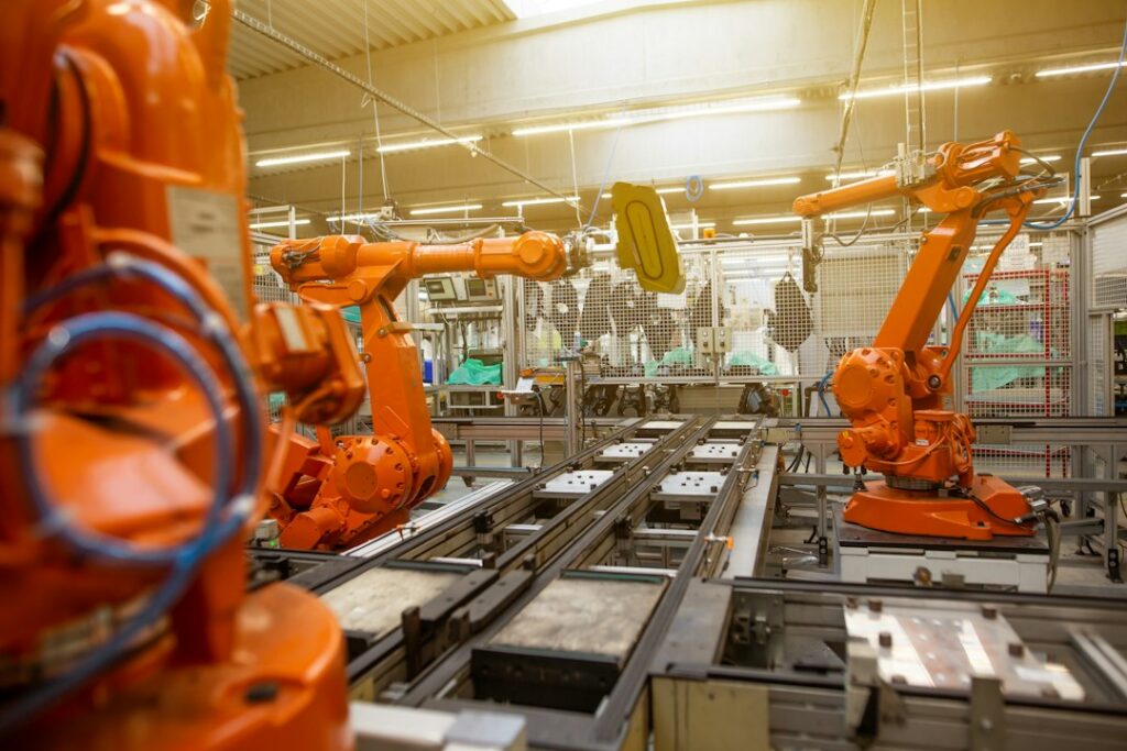 Industrial robot arm representing the growth of AI robotics in the physical world