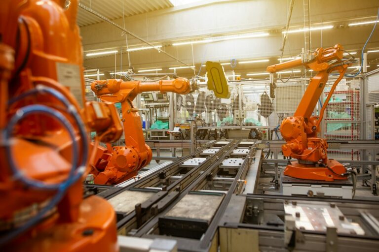 Industrial robot arm representing the growth of AI robotics in the physical world